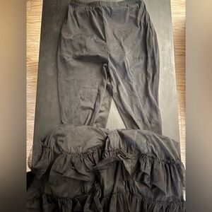 Akira black mesh flare pants